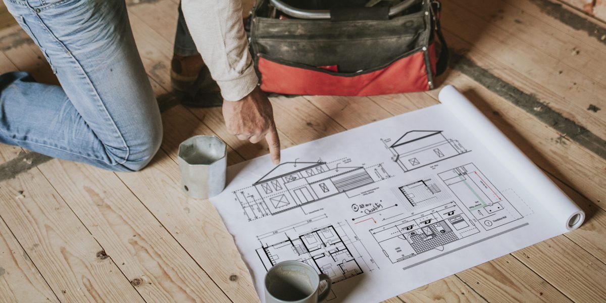 Floor plan psd mockup at a construction site